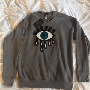 Sequence evil eye sweatshirt